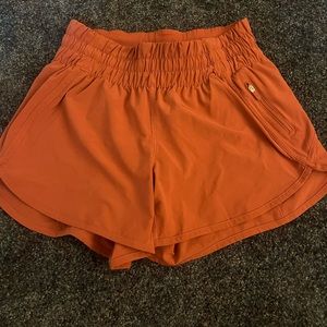 Lulu coral track shorts 4” size 6